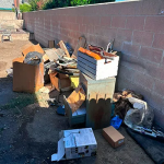 Property cleanout in Fontana CA with garage and home filled with junk and debris
