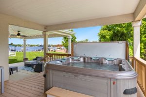 Residential hot tub on a backyard deck ready for removal in Fontana CA
